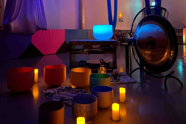 Floating sound baths in aerial hammocks at Steady Effort Yoga • Wellness • Sound